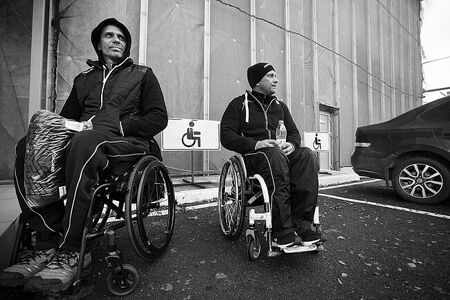14th October, 2019. «BasKI» wheelchair basketball team (Saint-Petersburg) wait for bus in parking lot, return to the hotel after competitions. All-Russian wheelchair basketball tournament preparation, Tyumen, 2019.